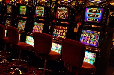 Slot games offer varied themes and bonus mechanics. Slot game interface showing reels and bonus features